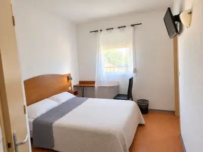 Habitación triple (1 a 3 personas)